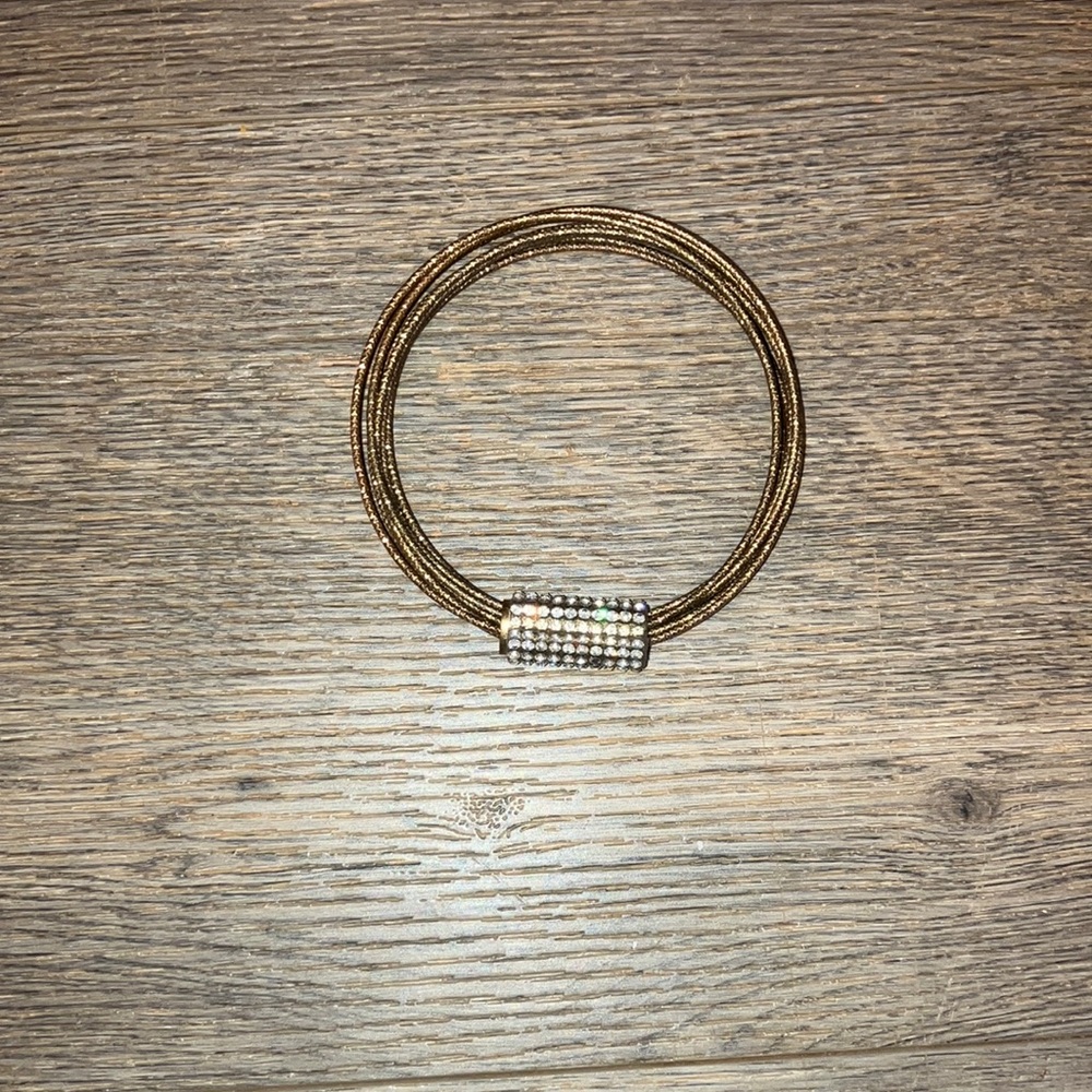 Elegant Gold Bracelet with Silver Accents